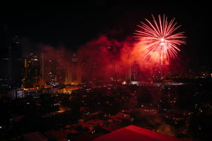 Chinese New Year fireworks over Makati at night, in Metro Manila, The Philippines.